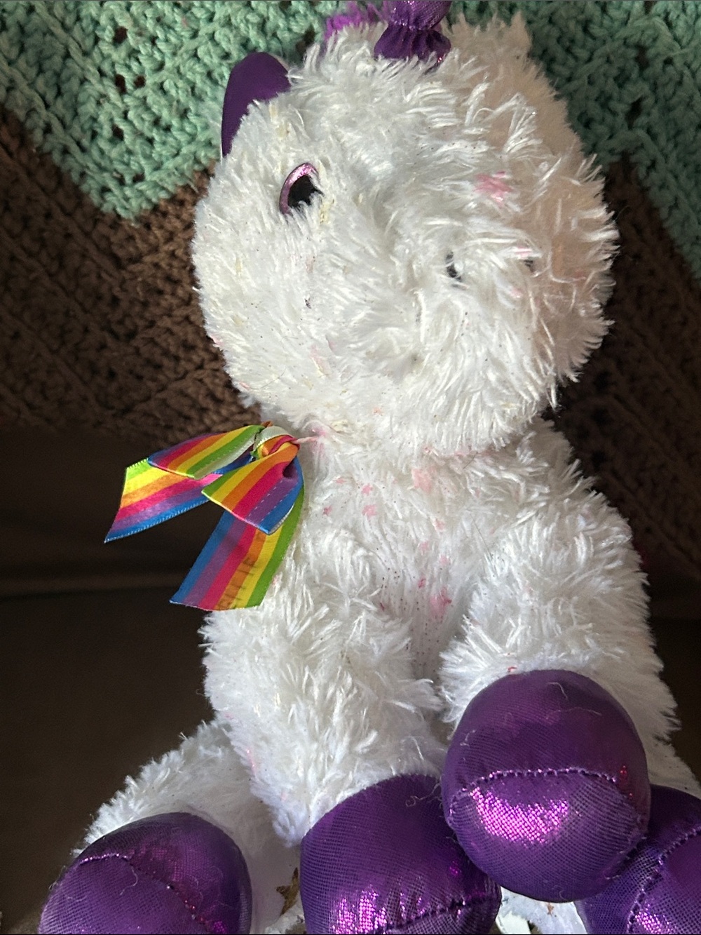 White Plush Unicorn with Purple Accents and Rainbow Ribbon